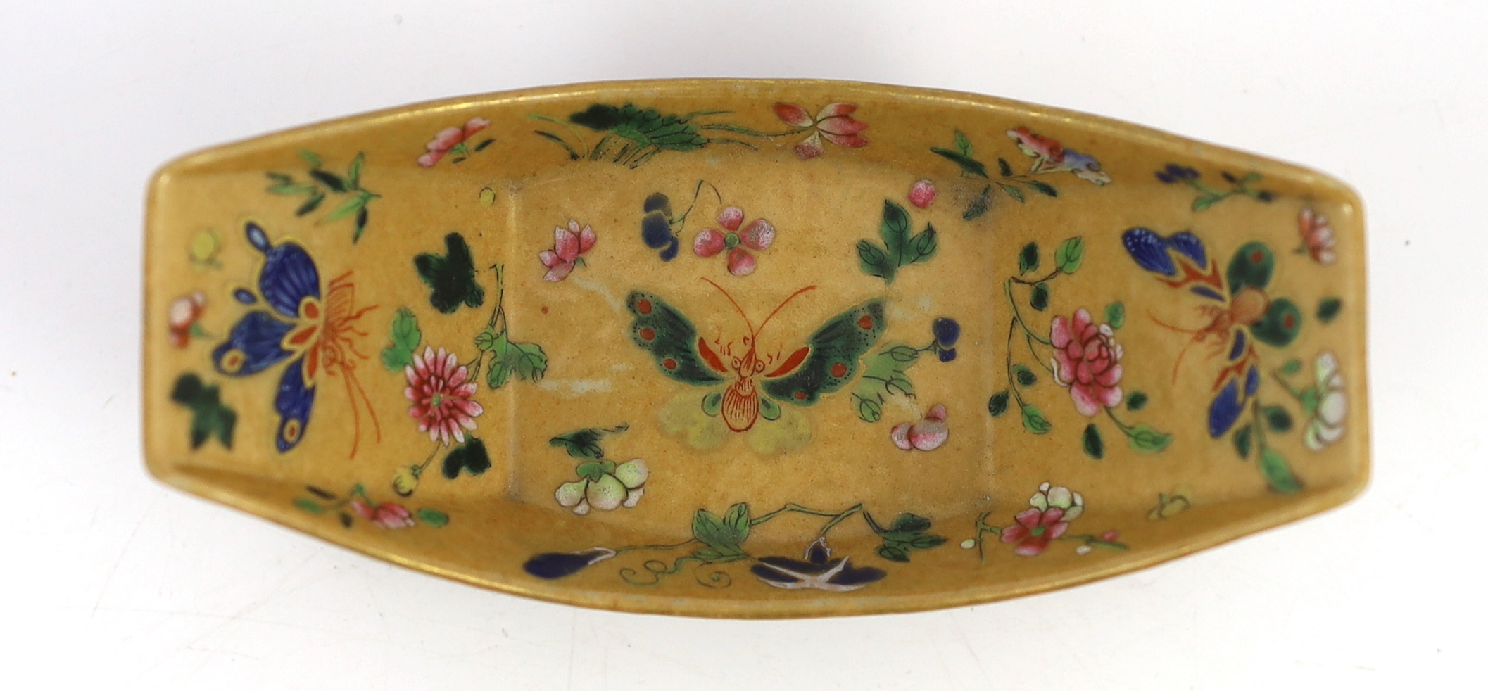 A Chinese enamelled porcelain ingot-shaped cup stand, Daoguang seal mark and of the period (1821-50)